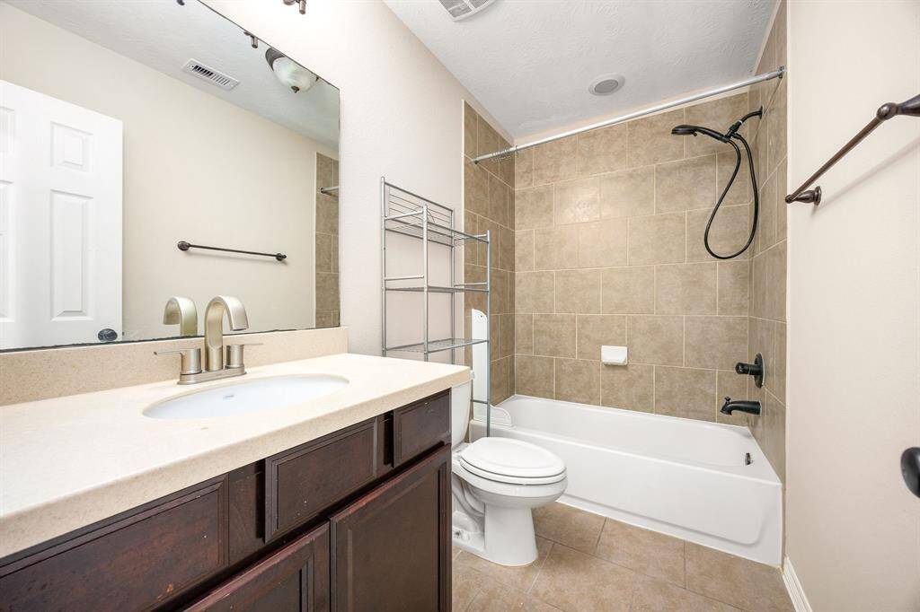 Second bathroom upstairs is shared between two bedrooms.