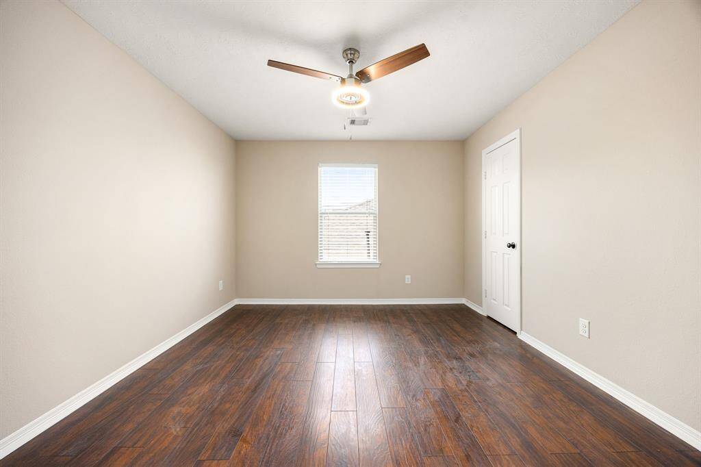 Secondary bedroom upstairs. Three upstairs bedrooms in total.