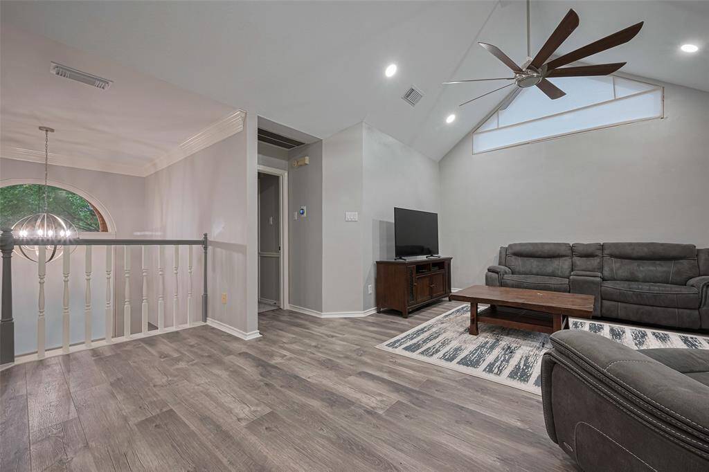 Gameroom opens to entry below.  Doorway in the photo leads to guest bedroom and bath.