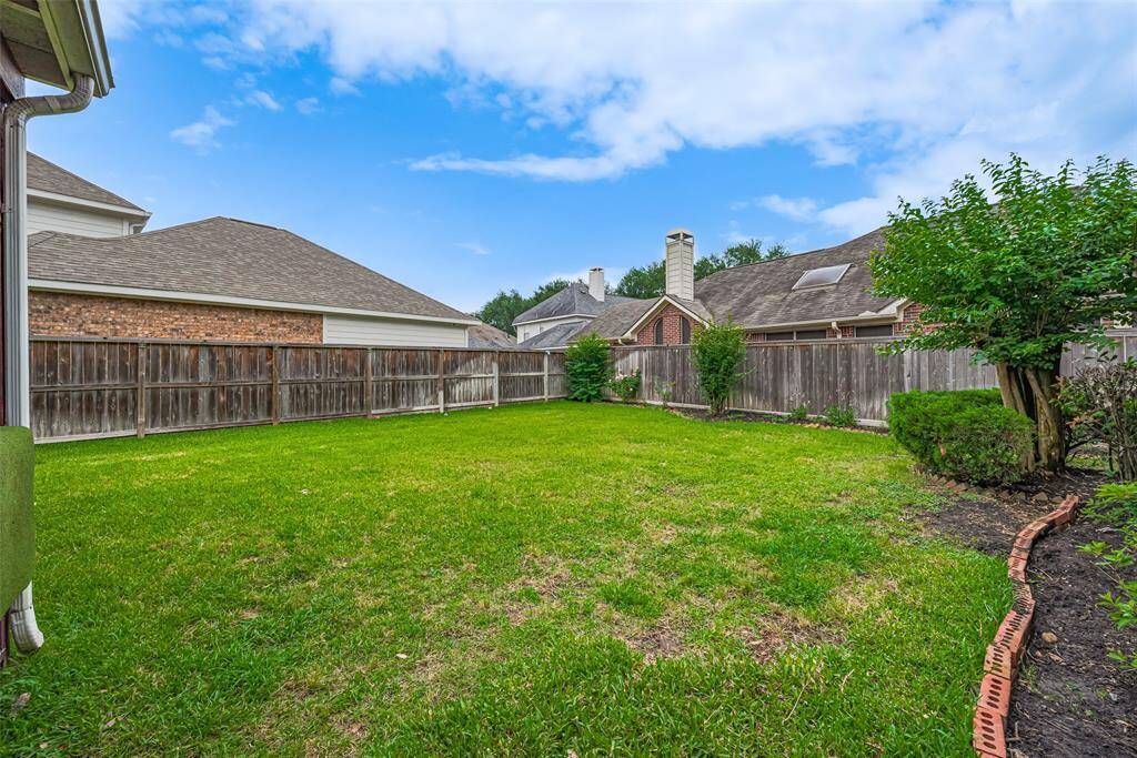 Enjoy serene views of the private backyard from the patio, with no two-story homes behind—offering added privacy and a peaceful outdoor retreat free from neighboring windows.