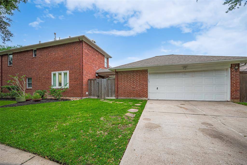 Garage is located to the side of the house allowing easy access into the kitchen -- always helpful when you are bringing in the groceries!