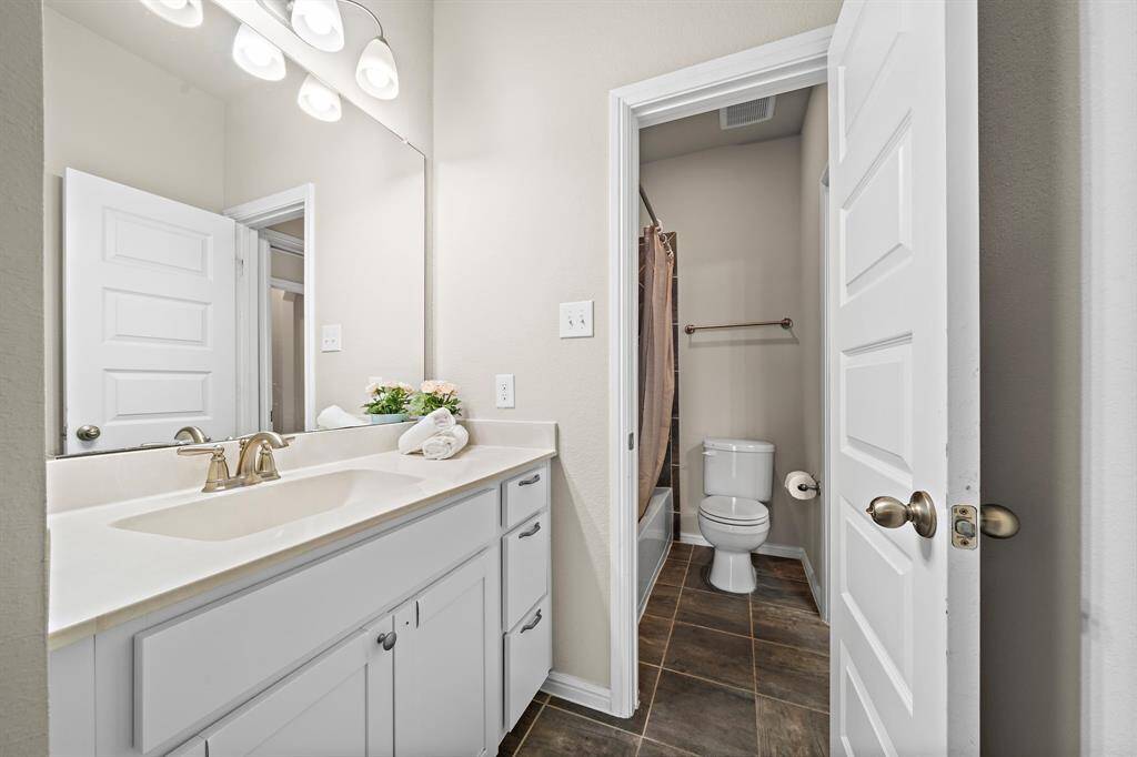 Full Bathroom #4, located on the 2nd floor, which is a Jack and Jill bathroom, shared between bedrooms #4 and #5.
