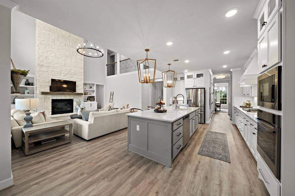 The kitchen overlooks the living room, making this an open floor plan and great for entertaining.