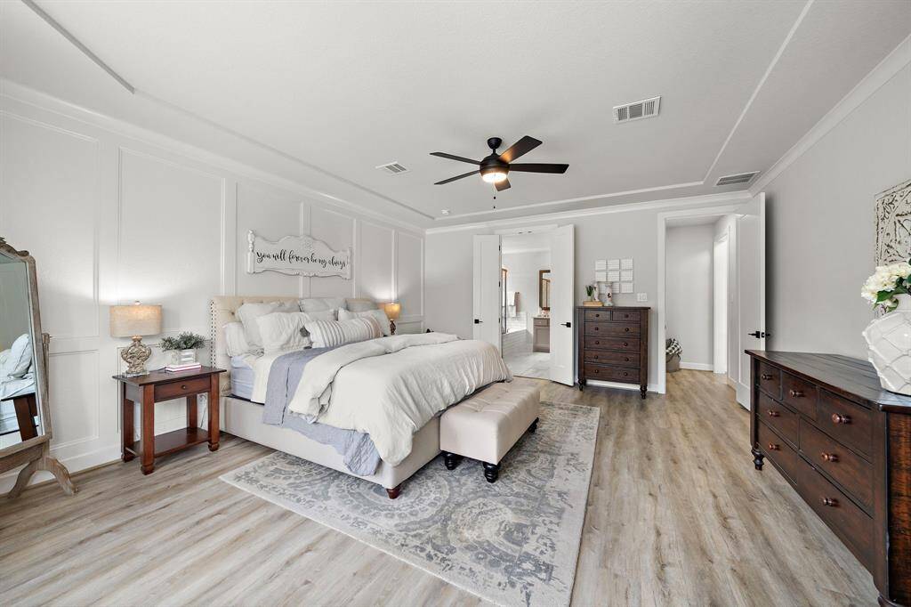 Another view of the primary bedroom.