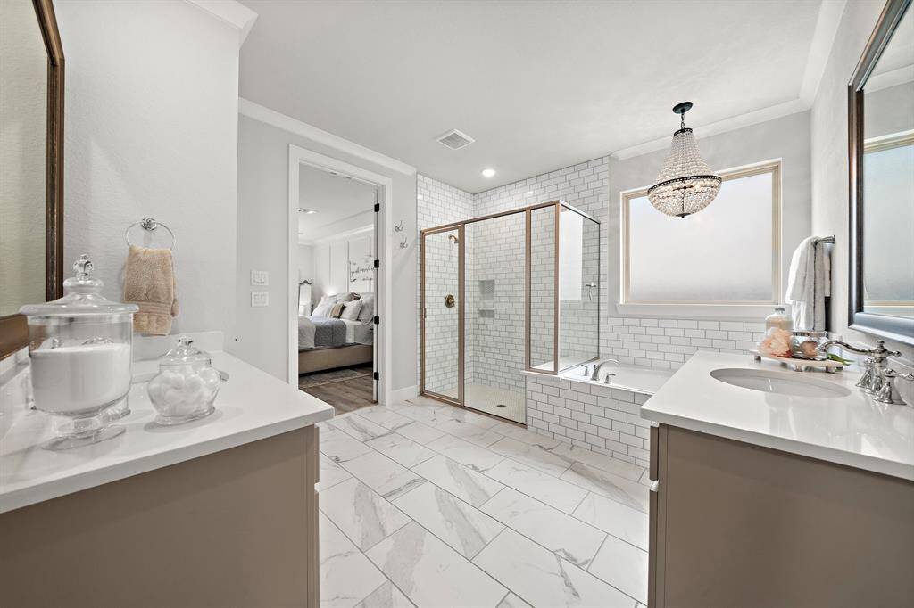 Notice the upgraded chandelier over the soaking tub.