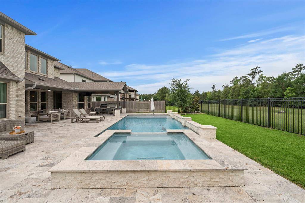 There is still plenty of grass area behind the pool.