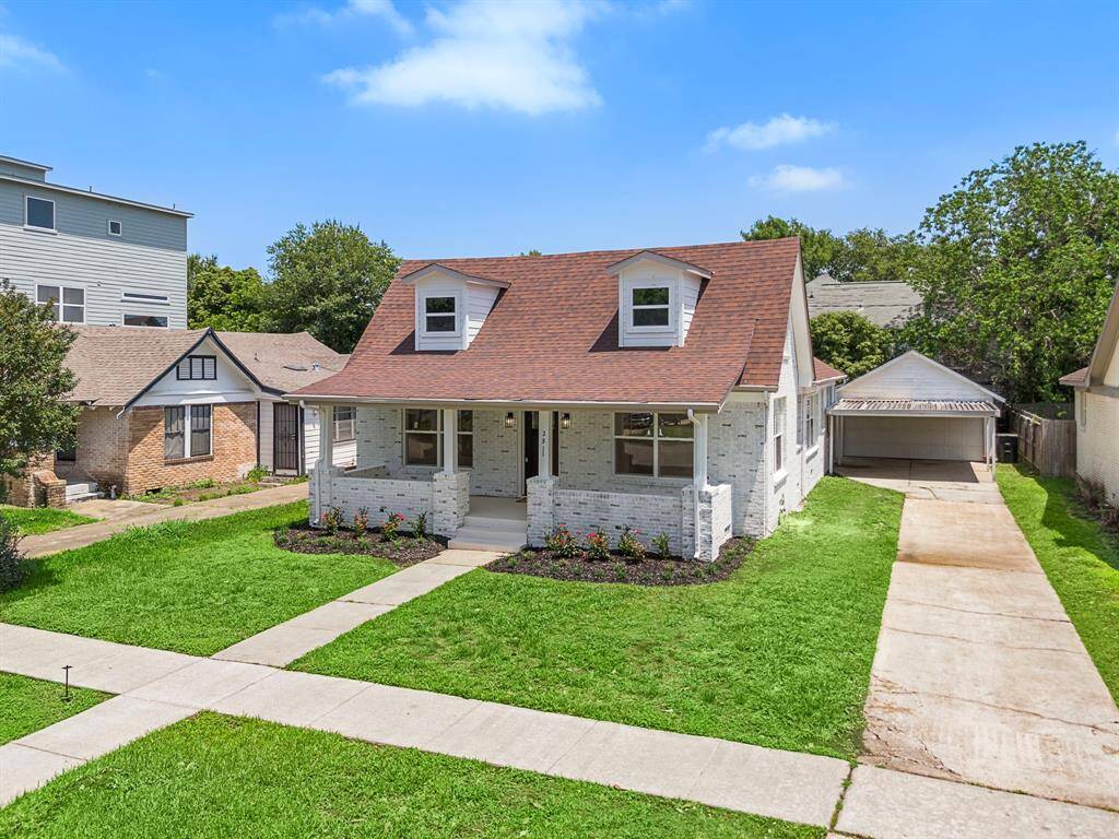 This 1930's-era home offers a refreshed appearance with recently installed dormer windows and a touch of modern influences. Great curb appeal with low maintenance flowerbeds.