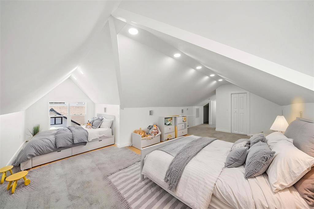 Impressive great room with high ceiling showcasing architectural charm.