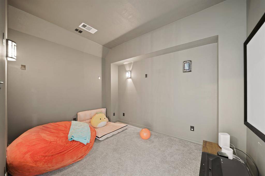 This cozy flex space is perfect for a media room.