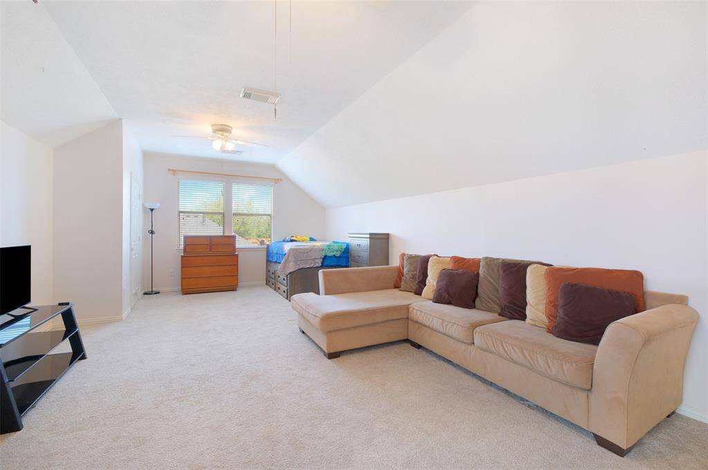Tucked away on the second floor, this spacious game room offers ultimate flexibility—complete with its own closet and half bath, making it a great option for a media room, home office, or even a fourth bedroom if desired.