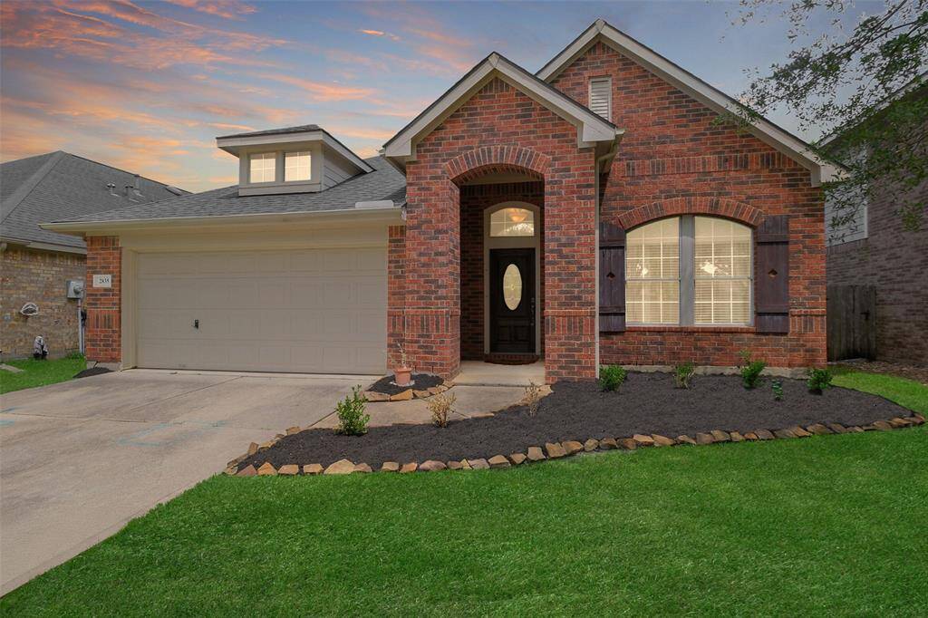 Located in the master-planned Firethorne community and zoned to award-winning Katy ISD, this charming red brick home offers standout curb appeal with a welcoming front porch, freshly mulched landscaping, and rich wood shutters that add warmth and character.