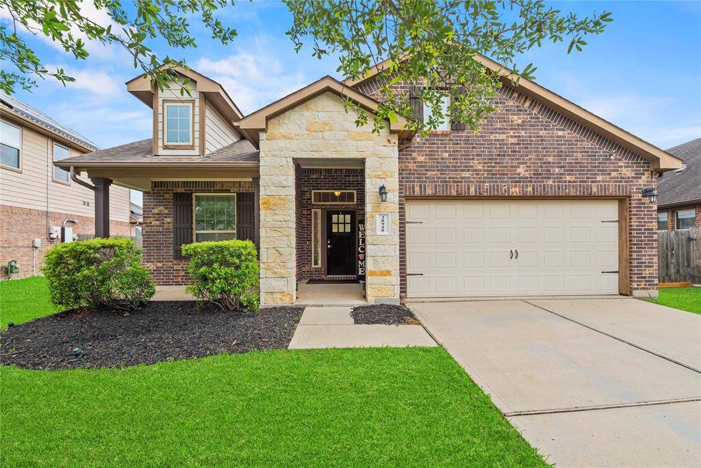 Welcome home to 28910 Dryander Forest Court, nestled in the prestigious Tamarron community! The stone and brick exterior exudes charm and elegance, creating exceptional street appeal that captivates at first glance.