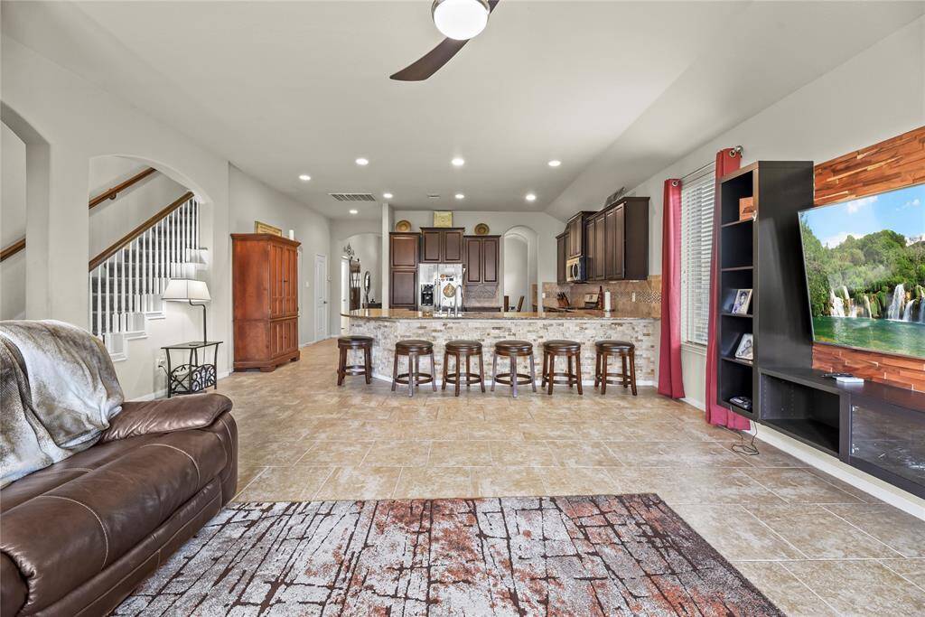 Experience open-concept living at its best, with a seamless layout that blends comfort, functionality, and style for effortless everyday living and entertaining.