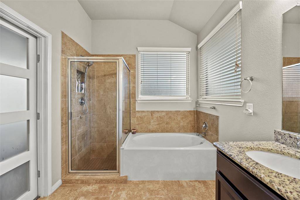 Relax in your deep soaking tub or opt for a quick rinse in the separate shower.