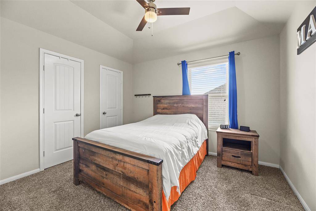 The expansive fourth bedroom upstairs offers incredible versatility—ideal as a guest suite, or perfect teen room, with ample space to suit your lifestyle needs.