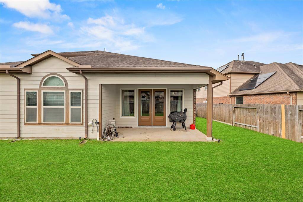 Now to the backyard space. Covered porch provides an area to relax and enjoy the large backyard.