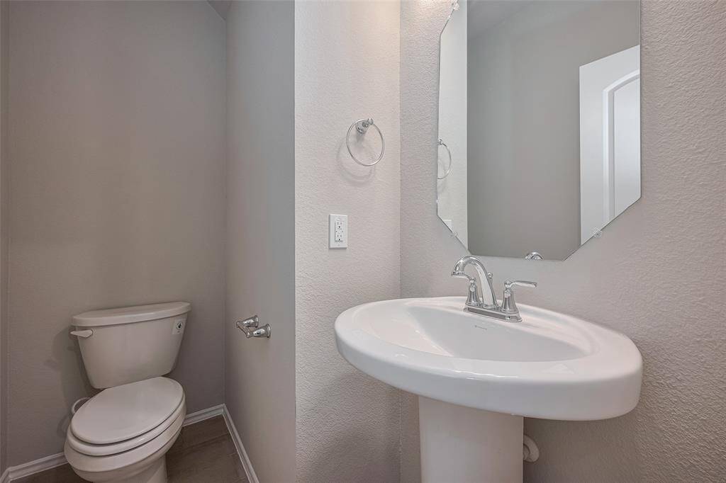 The perfect-sized half bath downstairs off the kitchen.