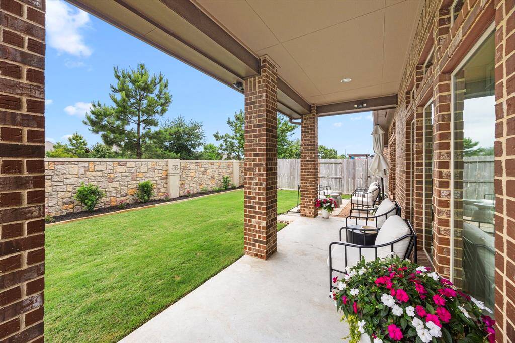Nicely built covered patio with recessed lighting.