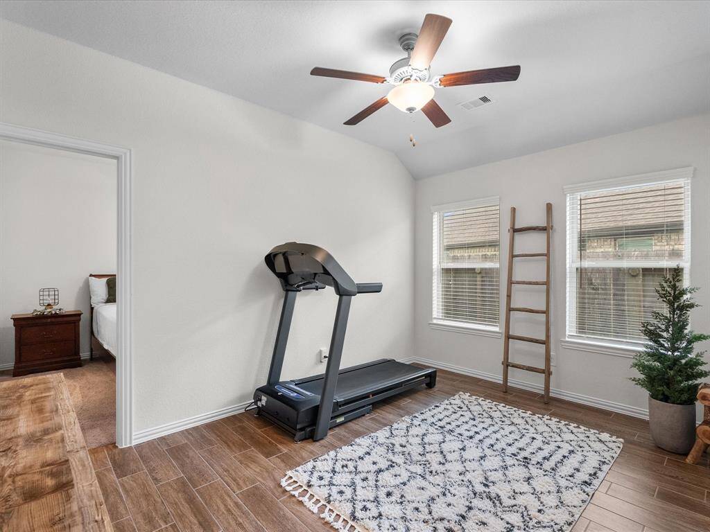This additional flex room in between the bedrooms could be used as a gym or play space.