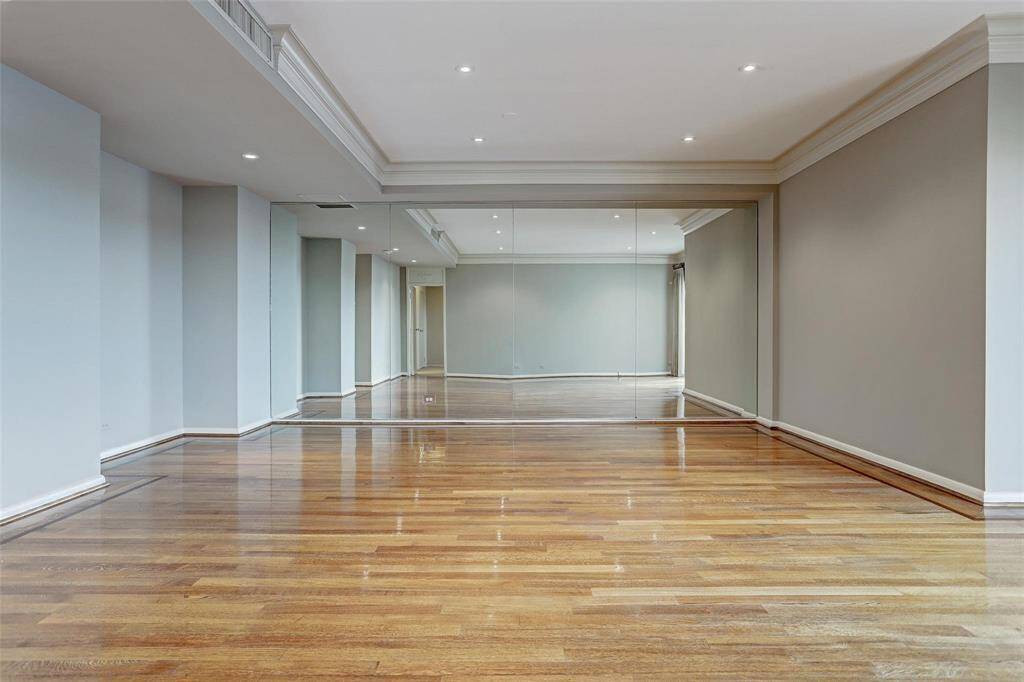 Dining room with mirrored wall.