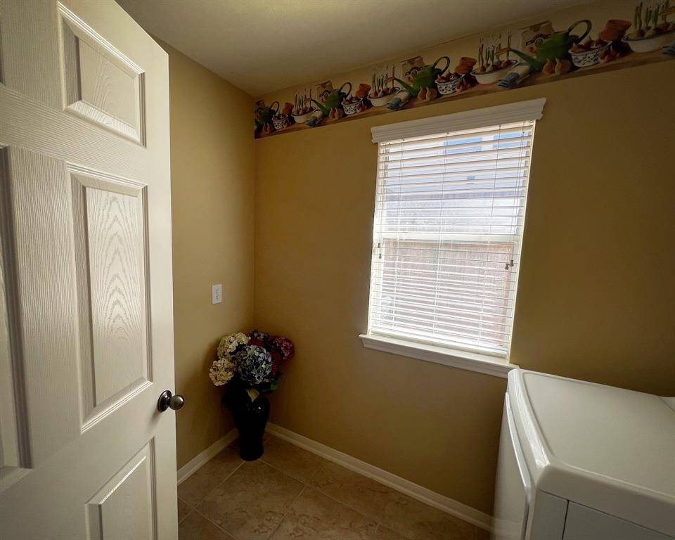 Bring your extra fridge, freezer, or whatever suits your needs for the additional space in the laundry room!