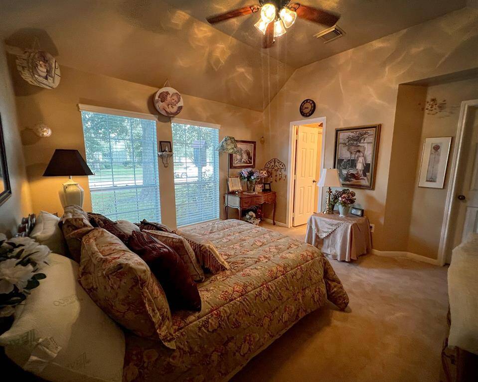 The large windows along the front and welcomed ceiling fan are sure to make a cozy comfortable space for its new residents.