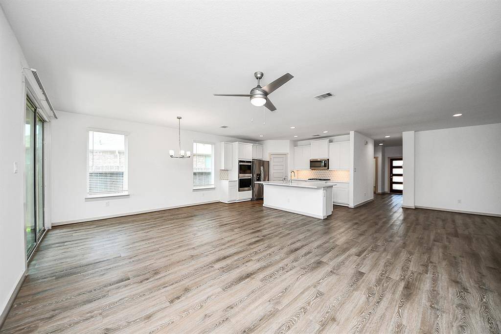 Gather around! The heart of this stunning home is perfect for entertaining and making memories!