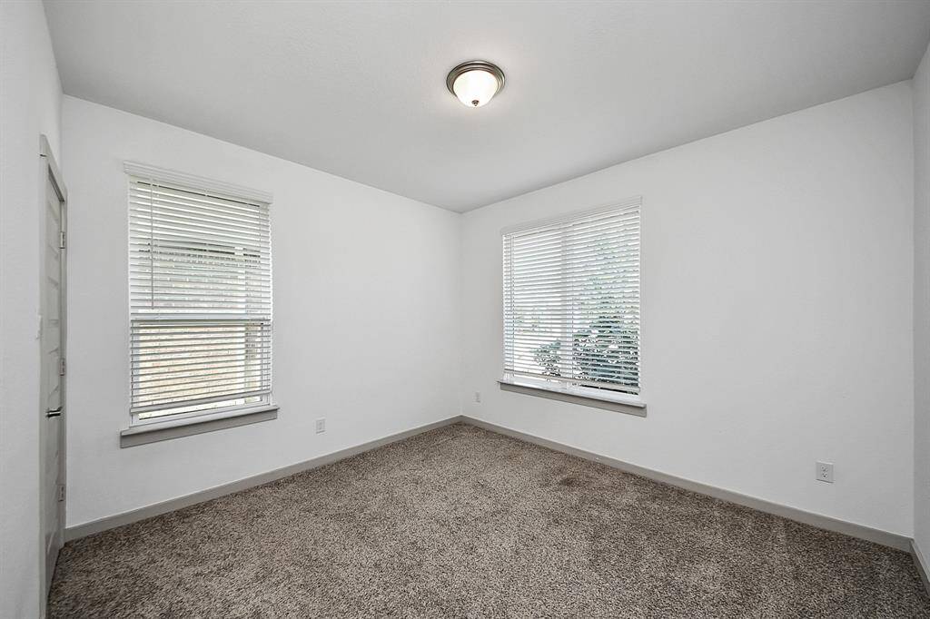 Bedroom 1! Bright and beautiful! This lovely bedroom is filled with ample natural light, creating a warm and inviting atmosphere!