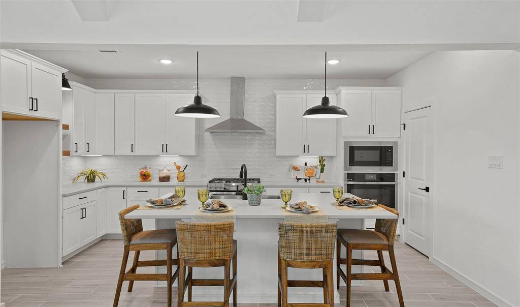 Lovely island kitchen (*Photo not of actual home and used for illustration purposes only.)
