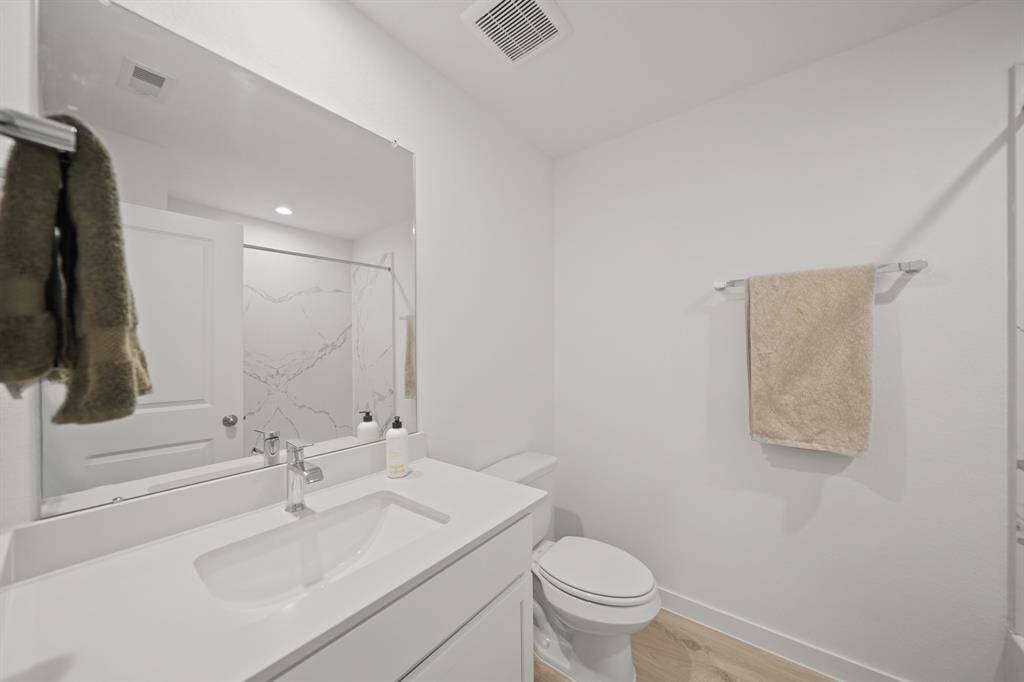 Downstairs full bathroom for guest + additional bedroom