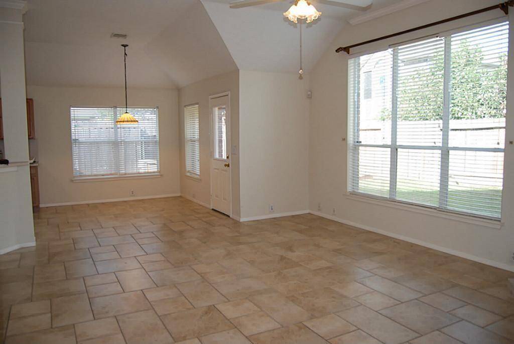 SECOND VIEW OF FAMILY ROOM AND BREAKFAST AREA