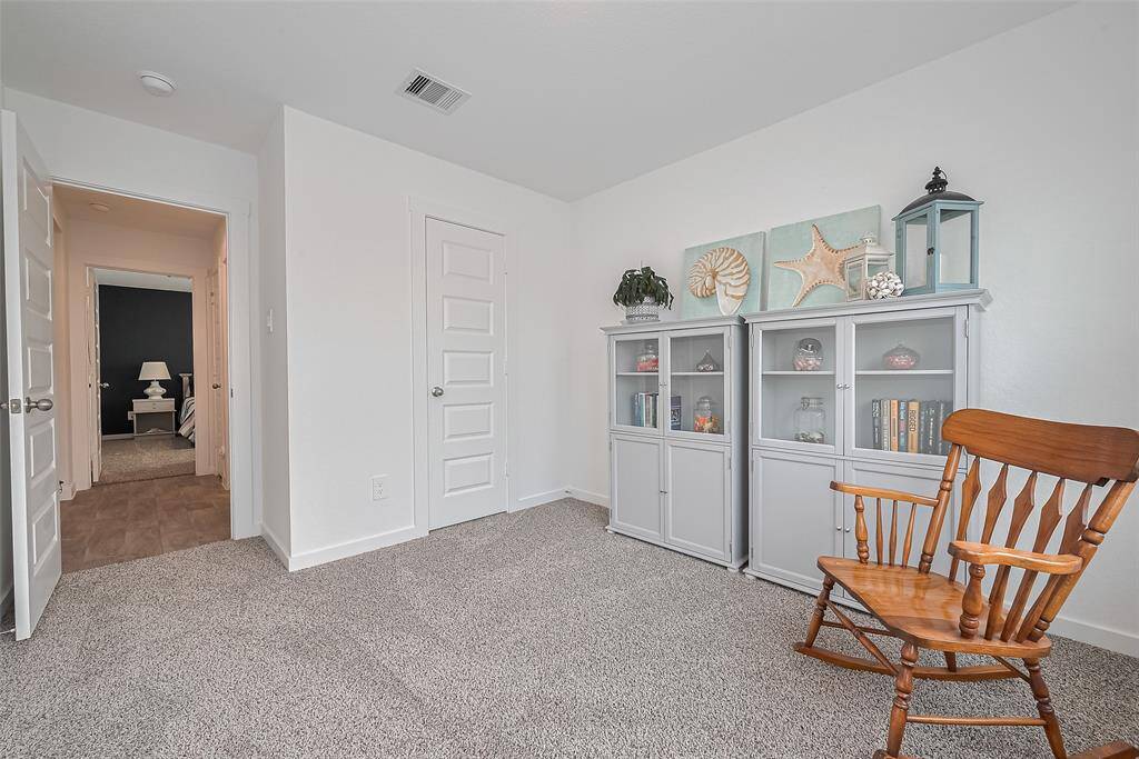 Also carpeted, this room offers ample space and versatility to suit a range of uses.