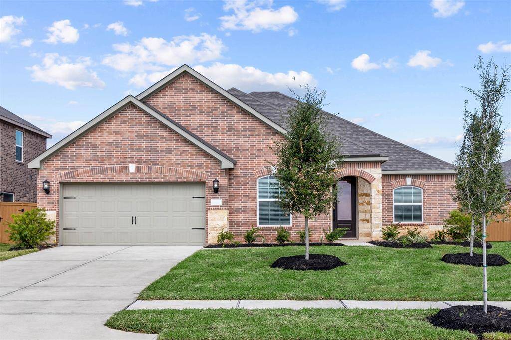 The Dockery Plan by LGI Homes. Completed example being built at 3206 Banyan Dr.