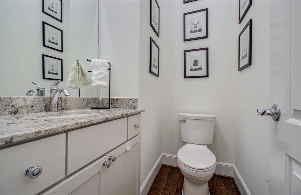 Conveniently located on the first floor, the powder room is perfect for guests and everyday use.