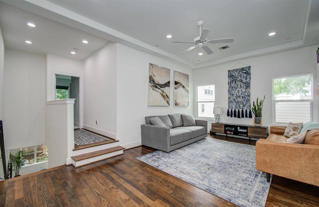 As you make your way upstairs, you’ll find a spacious game room perfectly positioned between the primary suite and secondary bedrooms—ideal for added privacy, movie nights, or a quiet play area.