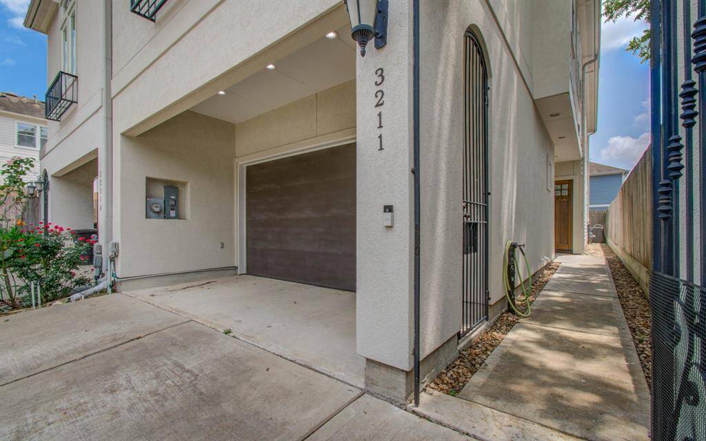 Lockable side and front gated entry provide added security and privacy to the home’s entrance.