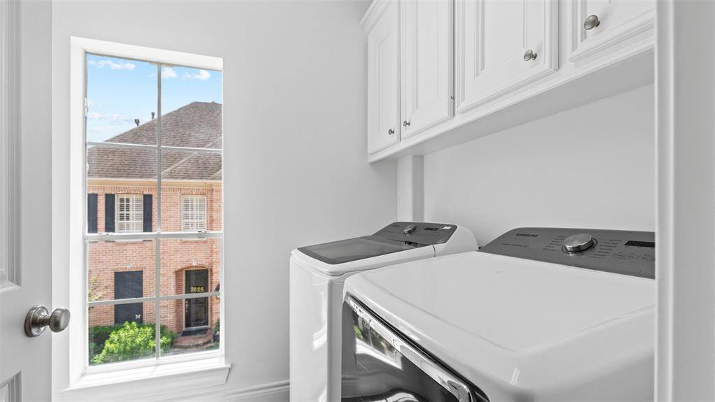 Laundry room located near on the second level with the bedrooms