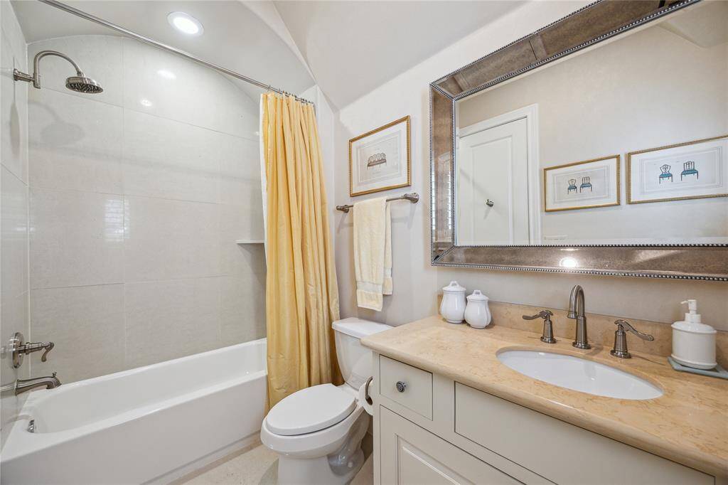 The secondary bath features a tub/shower combination.