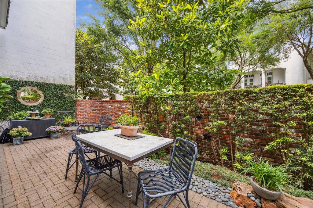 Enjoy dining alfresco with the beautiful courtyard as your backdrop, creating a serene and inviting setting for outdoor meals and gatherings.