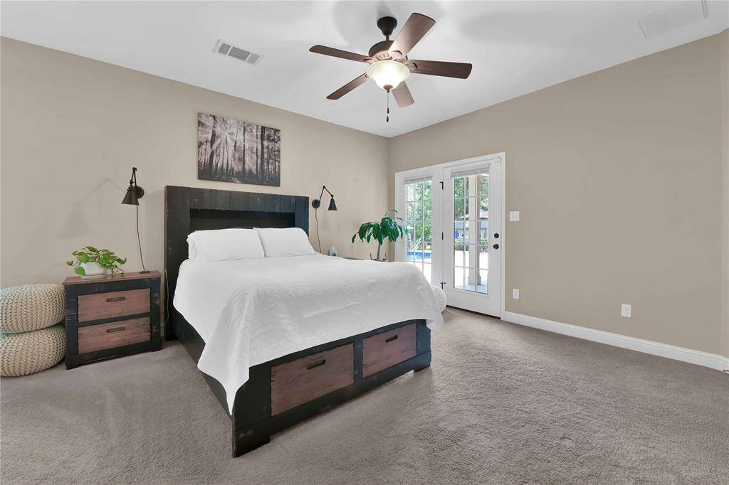 Primary bedroom with access to your outside oasis