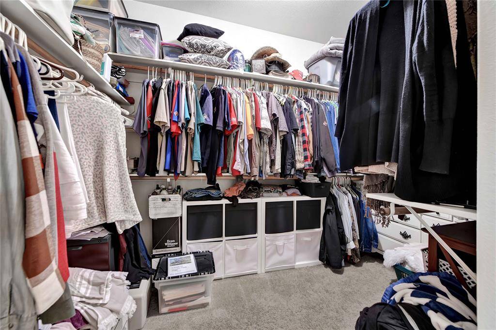 Check out this amazing walk in closet for the Primary Bedroom