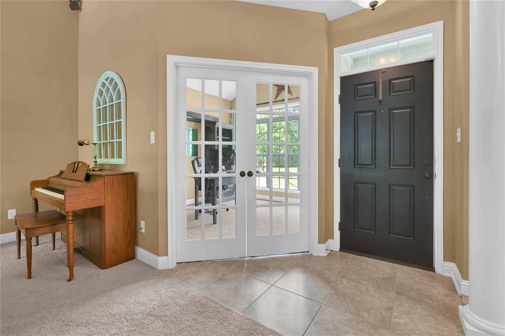 Nice open foyer with study/office to the right