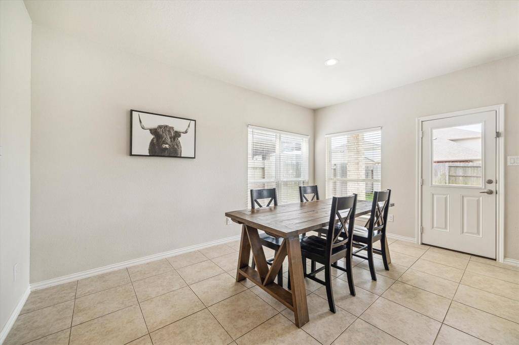 More than enough room in this dining area for a much larger table!