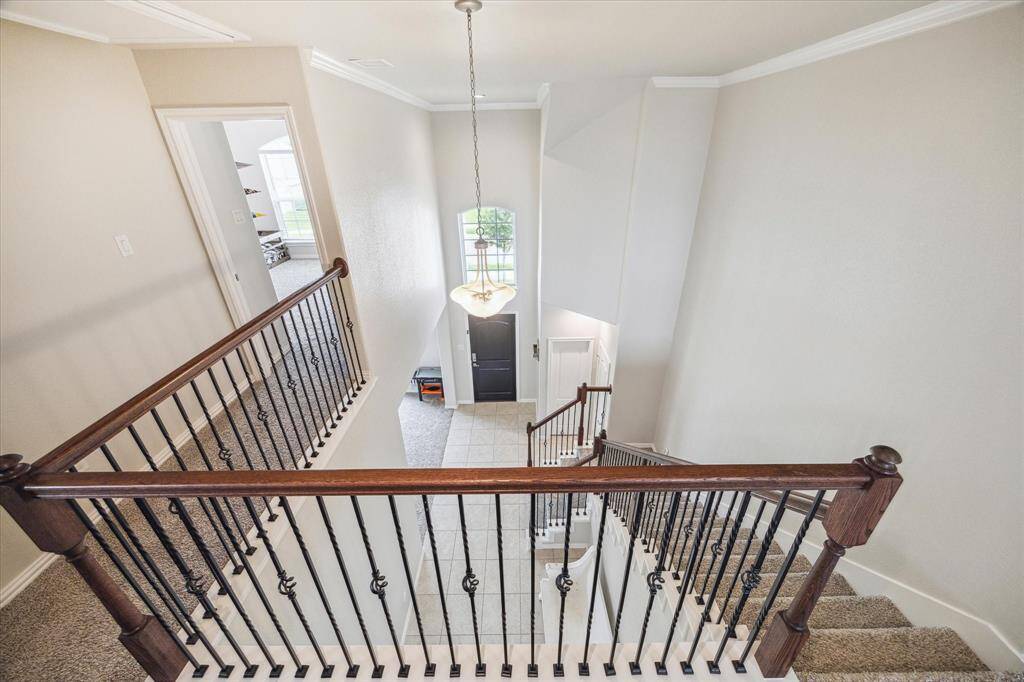 View from the top of the stairs through the upgraded wrought iron spindles.
