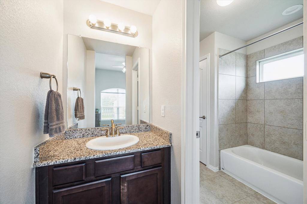 The private sink for bedroom 4 connecting to the Jack & Jill bathroom.