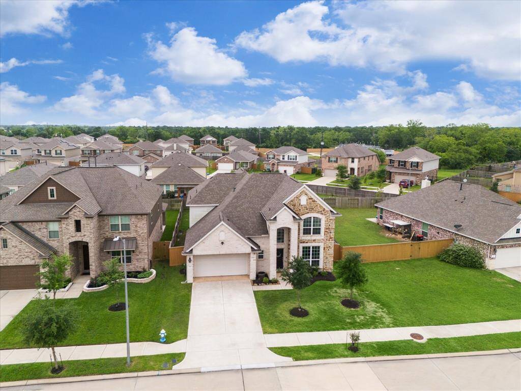 This home also features an oversized 2 car garage & double wide driveway w/ plenty of parking options for you and your guests.