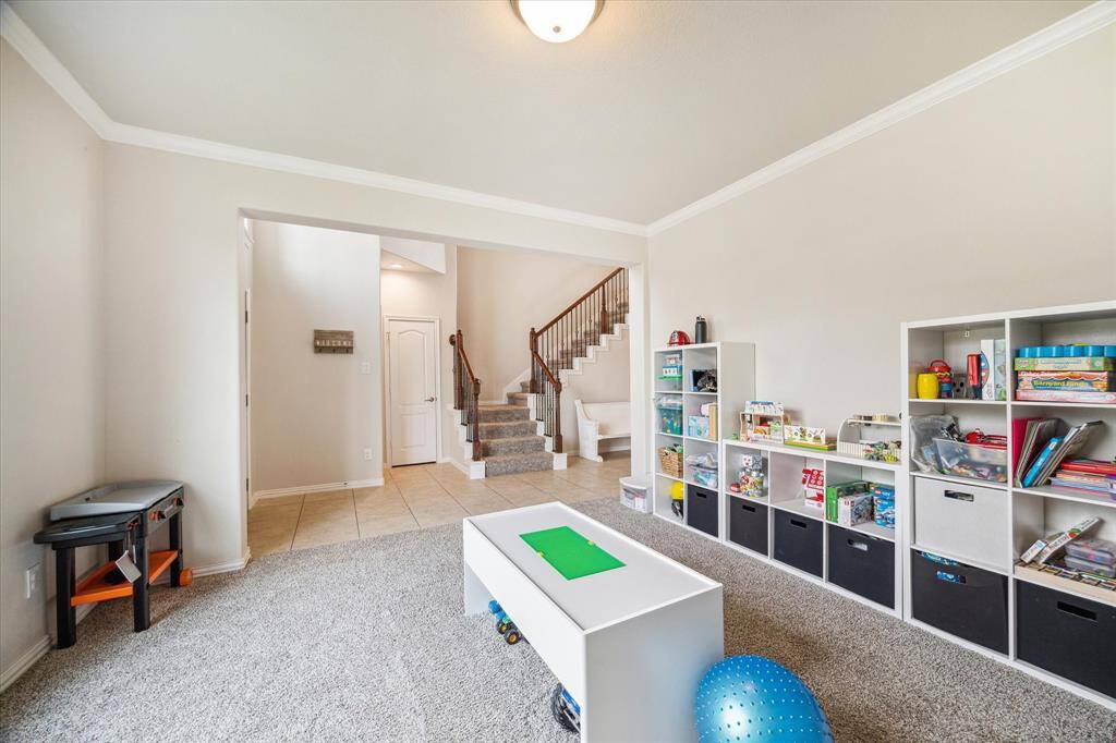 This front room just off the entry can flex to your needs - whether a home office; formal dining; or additional space for the kids is totally up to you!
