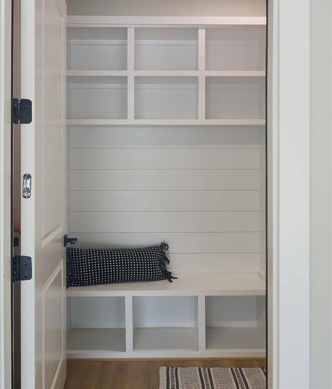 Extra touches like these built in shelves in the mud room area!