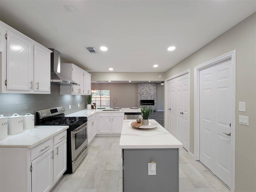 Open kitchen is modern and light & bright.