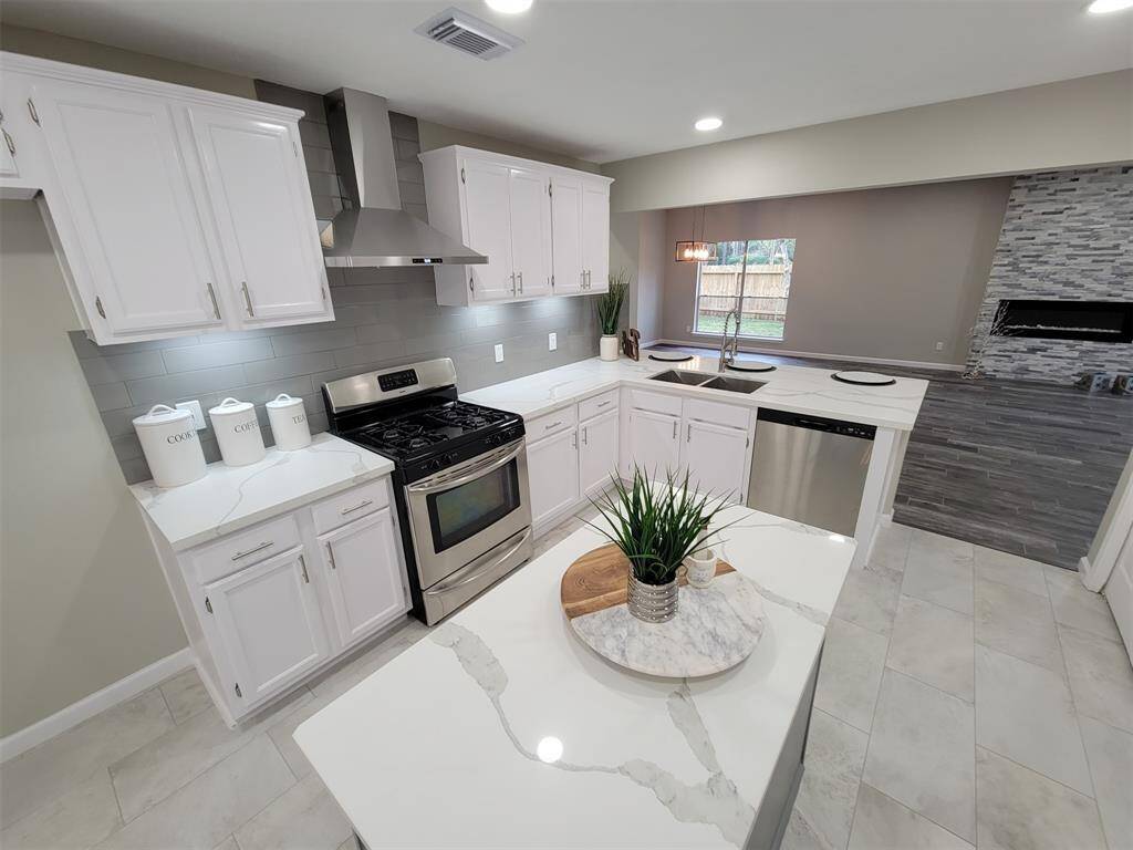 Calcutta Quartz countertops stand out!